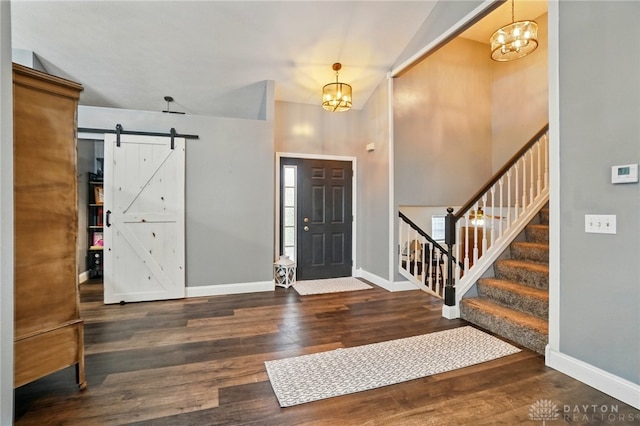 432 Applegate Rd, Englewood, OH 45322 - foyer featuring a chandelier, baseboards, wood finished floors, and stairway