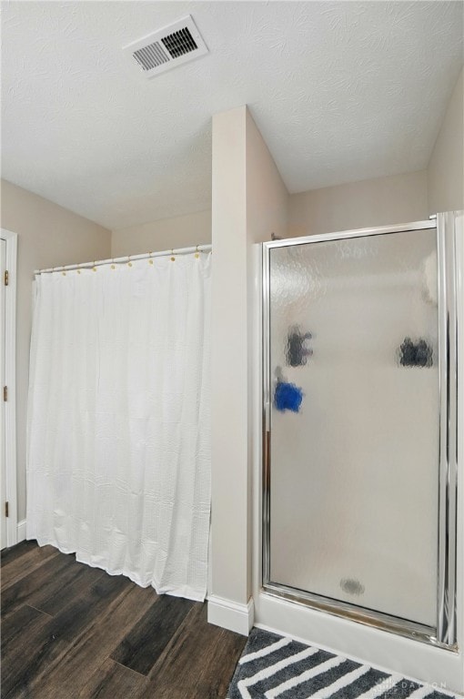 432 Applegate Rd, Englewood, OH 45322 - full bath featuring wood finished floors, a shower stall, and baseboards