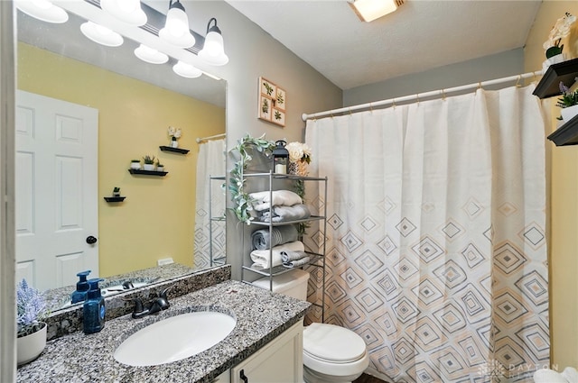 432 Applegate Rd, Englewood, OH 45322 - bathroom featuring toilet, vanity, and a shower with curtain