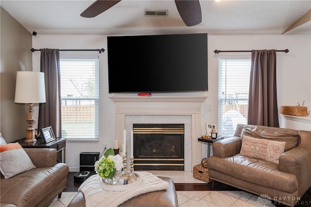 3008 Clearstream Way, Clayton, OH 45315 - living area with a ceiling fan and a premium fireplace