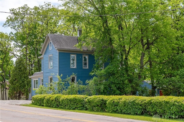 4370 Dayton Liberty Rd, Dayton, OH 45417 - view of home's exterior featuring a chimney