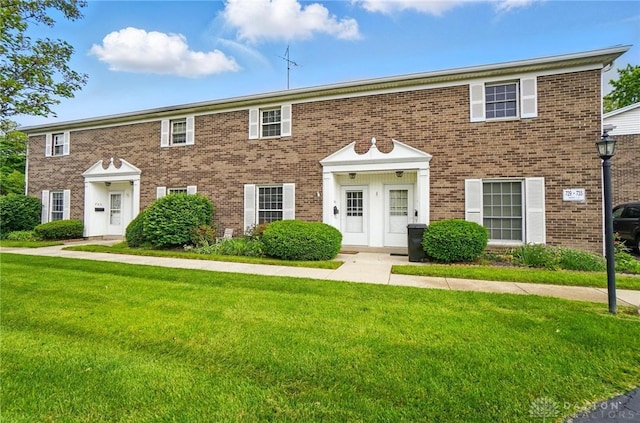 729 Clareridge Ln, Dayton, OH 45458 - colonial home featuring a front lawn and brick siding