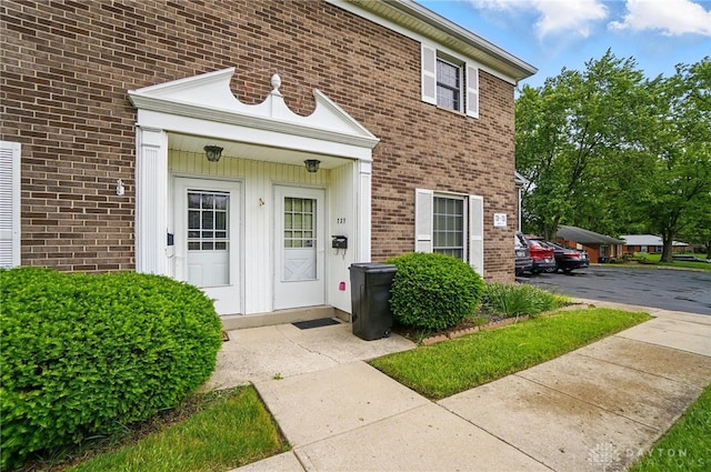 729 Clareridge Ln, Dayton, OH 45458 - property entrance featuring brick siding