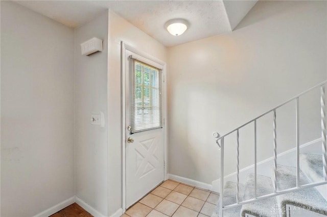 729 Clareridge Ln, Dayton, OH 45458 - entryway featuring baseboards and light tile patterned floors