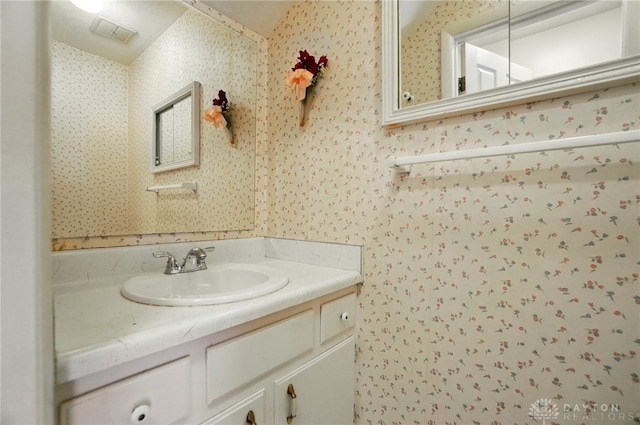 729 Clareridge Ln, Dayton, OH 45458 - bathroom featuring wallpapered walls and vanity