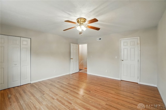 729 Clareridge Ln, Dayton, OH 45458 - unfurnished bedroom with light wood finished floors, baseboards, and ceiling fan