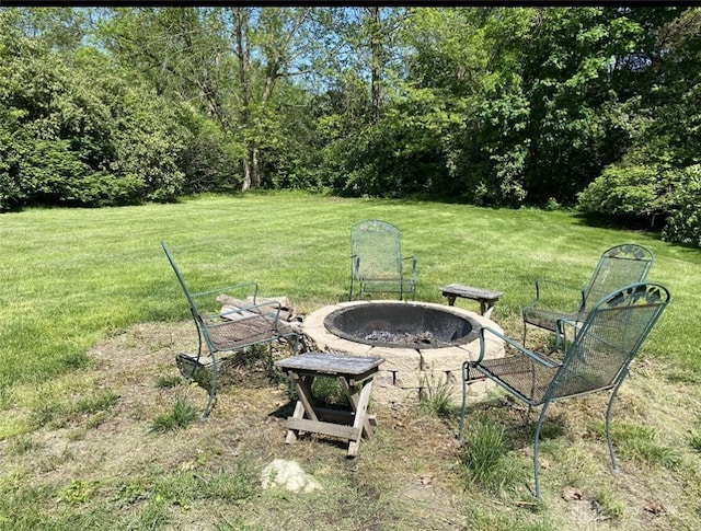 10520 Grand Vista Dr, Dayton, OH 45458 - view of green lawn featuring an outdoor fire pit