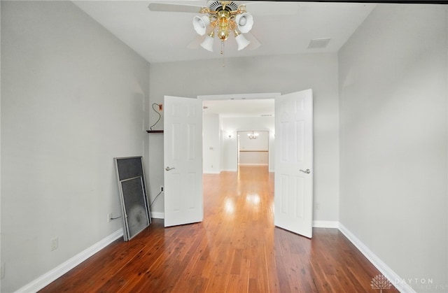220 Fivepines Ct, Englewood, OH 45315 - unfurnished room with a ceiling fan, hardwood / wood-style flooring, and baseboards