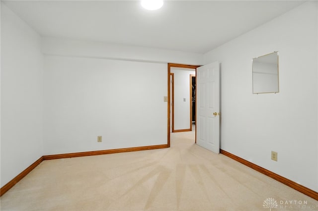 220 Fivepines Ct, Englewood, OH 45315 - spare room with baseboards and light colored carpet