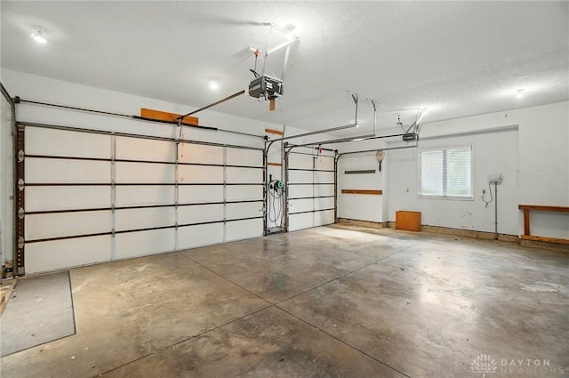 220 Fivepines Ct, Englewood, OH 45315 - garage featuring a garage door opener