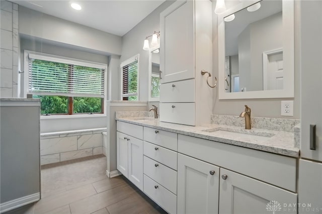 220 Fivepines Ct, Englewood, OH 45315 - full bathroom featuring double vanity and recessed lighting