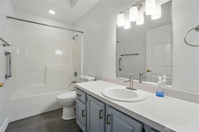 220 Fivepines Ct, Englewood, OH 45315 - full bath featuring toilet, vanity, shower / bathtub combination, recessed lighting, and wood finished floors