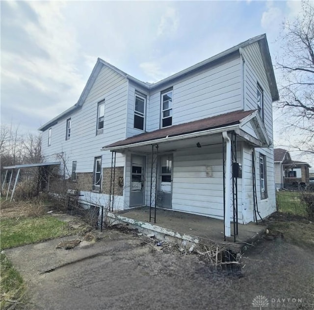 126 Arlington Ave, Dayton, OH 45417 - view of front of home featuring covered porch