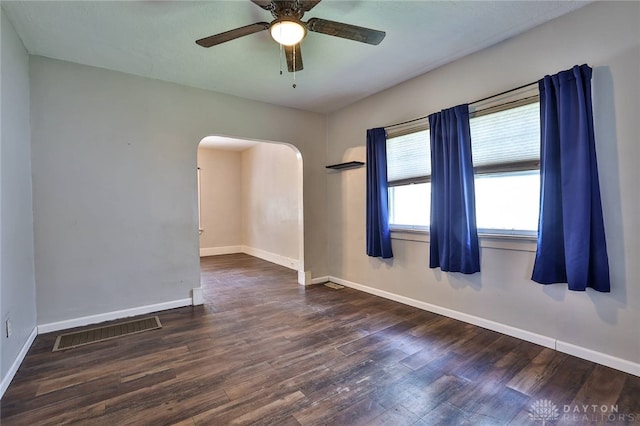 27 S Quentin Ave, Dayton, OH 45403 - unfurnished room with arched walkways, wood finished floors, and a ceiling fan