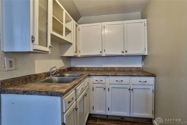 27 S Quentin Ave, Dayton, OH 45403 - kitchen with dark countertops, decorative backsplash, and white cabinets