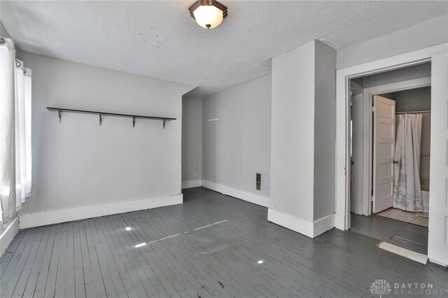 27 S Quentin Ave, Dayton, OH 45403 - unfurnished room with wood-type flooring and healthy amount of natural light