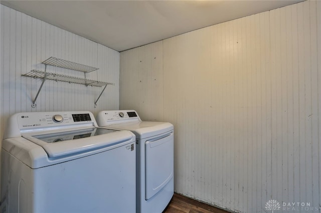 27 S Quentin Ave, Dayton, OH 45403 - washroom featuring washing machine and dryer, dark wood-type flooring, and wood walls