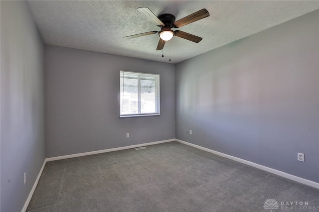 5695 E Coach Dr Unit E, Kettering, OH 45440 - unfurnished room with a ceiling fan, carpet, baseboards, and a textured ceiling