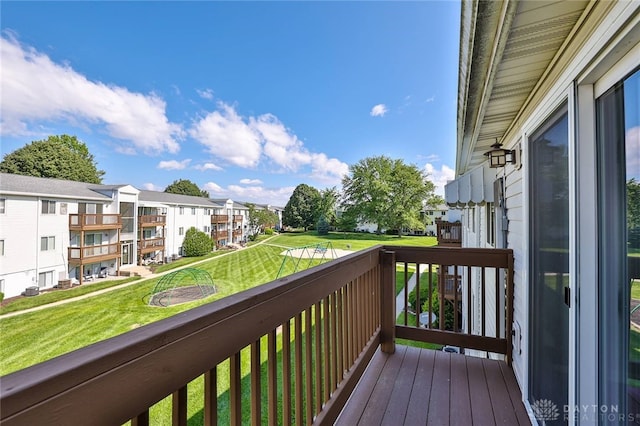 5695 E Coach Dr Unit E, Kettering, OH 45440 - wooden deck featuring a residential view and a yard