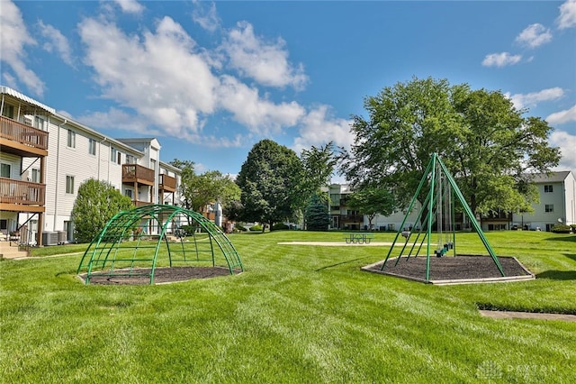 5695 E Coach Dr Unit E, Kettering, OH 45440 - view of grassy yard featuring central AC