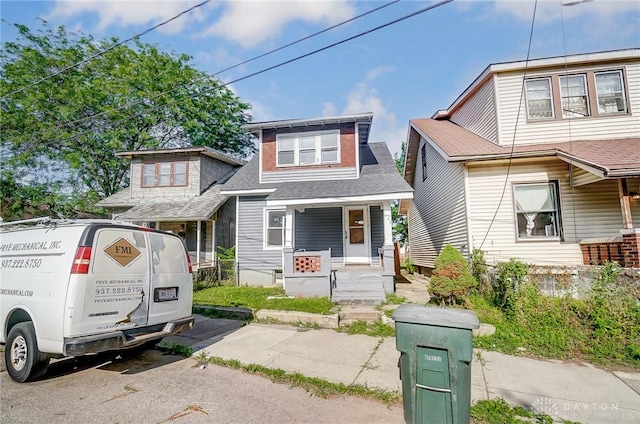 133 Bircher Ave, Dayton, OH 45403 - view of front facade with a porch and roof with shingles