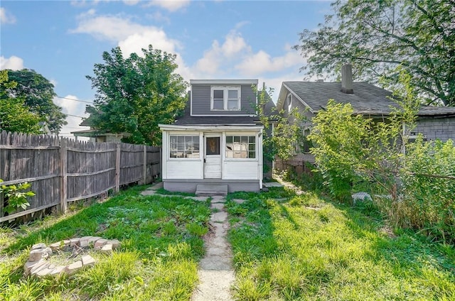 133 Bircher Ave, Dayton, OH 45403 - back of house featuring a fenced backyard and entry steps