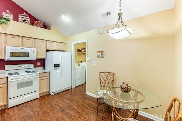 91 Villa Pointe Dr, Springboro, OH 45066 - kitchen featuring white appliances, washing machine and dryer, light countertops, dark wood-style floors, and pendant lighting