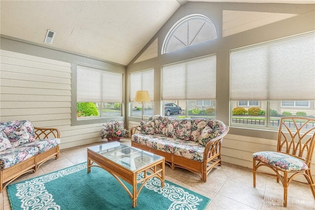 91 Villa Pointe Dr, Springboro, OH 45066 - sunroom with vaulted ceiling, healthy amount of natural light, tile patterned floors, and wood walls