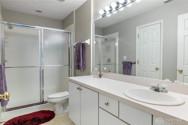 91 Villa Pointe Dr, Springboro, OH 45066 - full bathroom featuring vanity, a shower stall, toilet, and tile patterned flooring