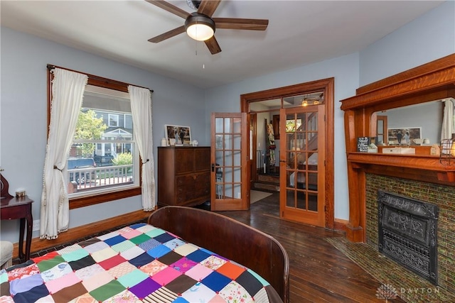 25 La Belle St, Dayton, OH 45403 - bedroom featuring french doors, wood-type flooring, a fireplace, and baseboards