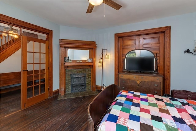 25 La Belle St, Dayton, OH 45403 - bedroom featuring wood finished floors, a fireplace, and ceiling fan