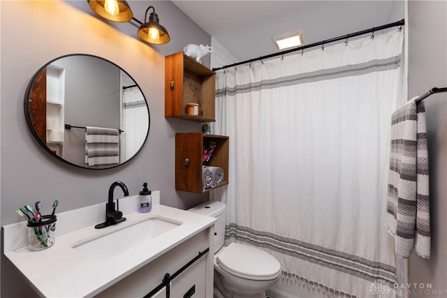25 La Belle St, Dayton, OH 45403 - bathroom featuring toilet, vanity, and a shower with curtain
