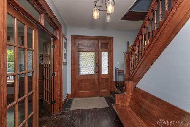 25 La Belle St, Dayton, OH 45403 - foyer with dark wood-style flooring, stairway, a chandelier, french doors, and baseboards
