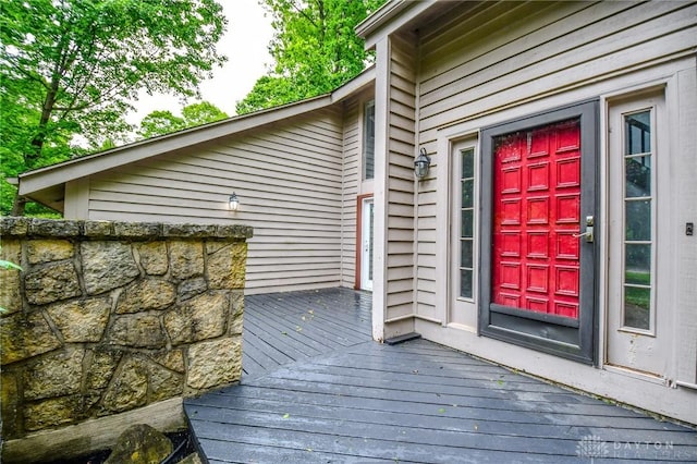 222 Walnut Grove Dr, Centerville, OH 45458 - view of exterior entry with a deck and stone siding