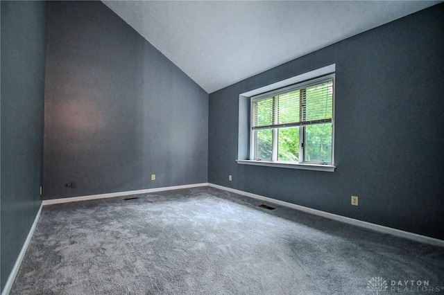 222 Walnut Grove Dr, Centerville, OH 45458 - empty room featuring vaulted ceiling, carpet flooring, and baseboards
