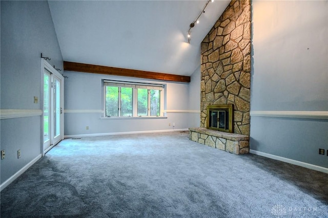 222 Walnut Grove Dr, Centerville, OH 45458 - unfurnished living room featuring carpet flooring, track lighting, baseboards, a fireplace, and high vaulted ceiling