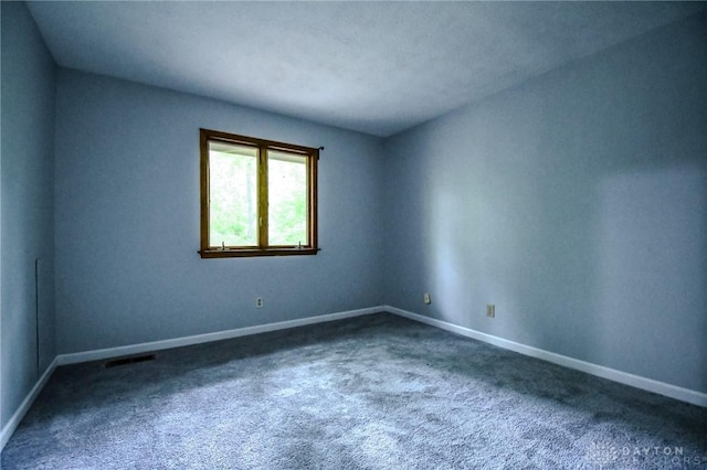 222 Walnut Grove Dr, Centerville, OH 45458 - spare room with baseboards and dark carpet