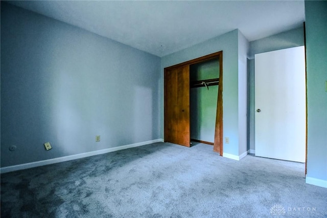 222 Walnut Grove Dr, Centerville, OH 45458 - unfurnished bedroom with carpet flooring, baseboards, and a closet