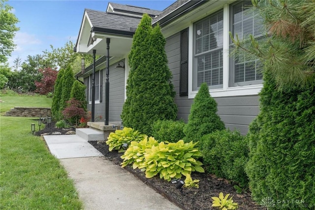 2242 Turnbull Rd, Beavercreek, OH 45431 - entrance to property with a lawn and a shingled roof