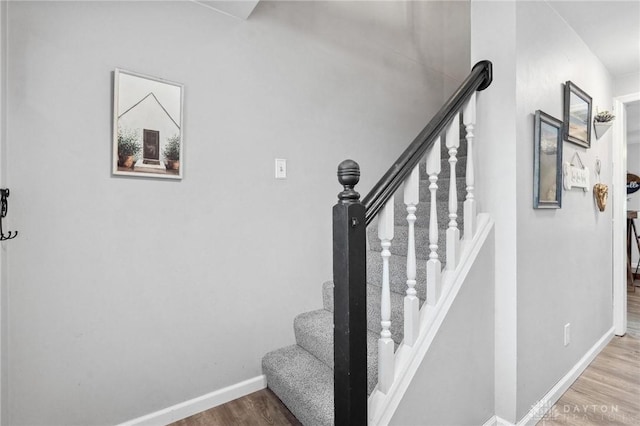 2242 Turnbull Rd, Beavercreek, OH 45431 - staircase featuring wood finished floors and baseboards