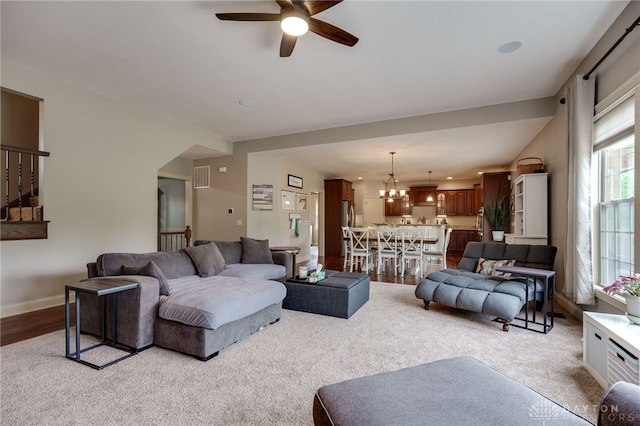 10067 Yearling Run, Dayton, OH 45458 - living area with ceiling fan, a chandelier, baseboards, and carpet floors