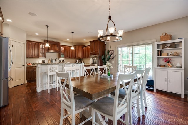 10067 Yearling Run, Dayton, OH 45458 - dining room with recessed lighting, dark wood-style floors, and a chandelier
