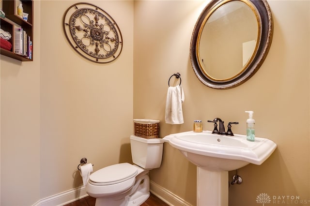 10067 Yearling Run, Dayton, OH 45458 - bathroom featuring baseboards, toilet, and wood finished floors