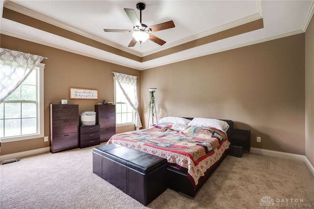 10067 Yearling Run, Dayton, OH 45458 - carpeted bedroom with crown molding, multiple windows, baseboards, and a raised ceiling
