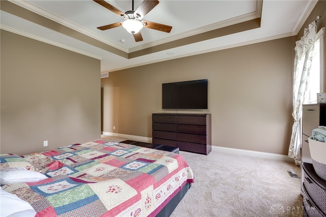 10067 Yearling Run, Dayton, OH 45458 - bedroom with ornamental molding, a tray ceiling, carpet flooring, ceiling fan, and baseboards