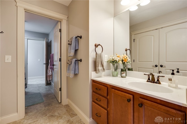 10067 Yearling Run, Dayton, OH 45458 - bathroom with vanity and baseboards