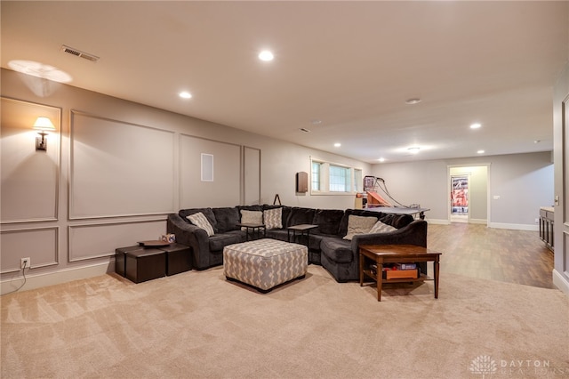 10067 Yearling Run, Dayton, OH 45458 - carpeted living area with recessed lighting and a decorative wall