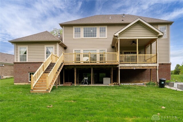 10067 Yearling Run, Dayton, OH 45458 - rear view of property with a ceiling fan, a deck, a yard, and stairs