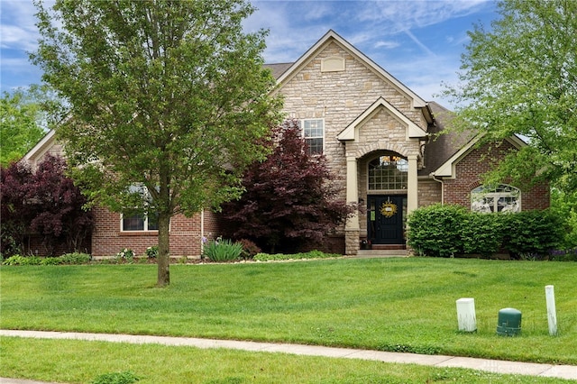 10067 Yearling Run, Dayton, OH 45458 - view of front of property with stone siding and a front yard