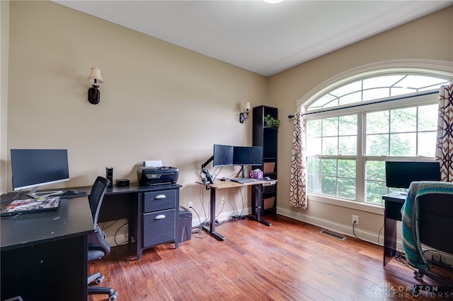 10067 Yearling Run, Dayton, OH 45458 - office area with healthy amount of natural light, wood finished floors, and baseboards